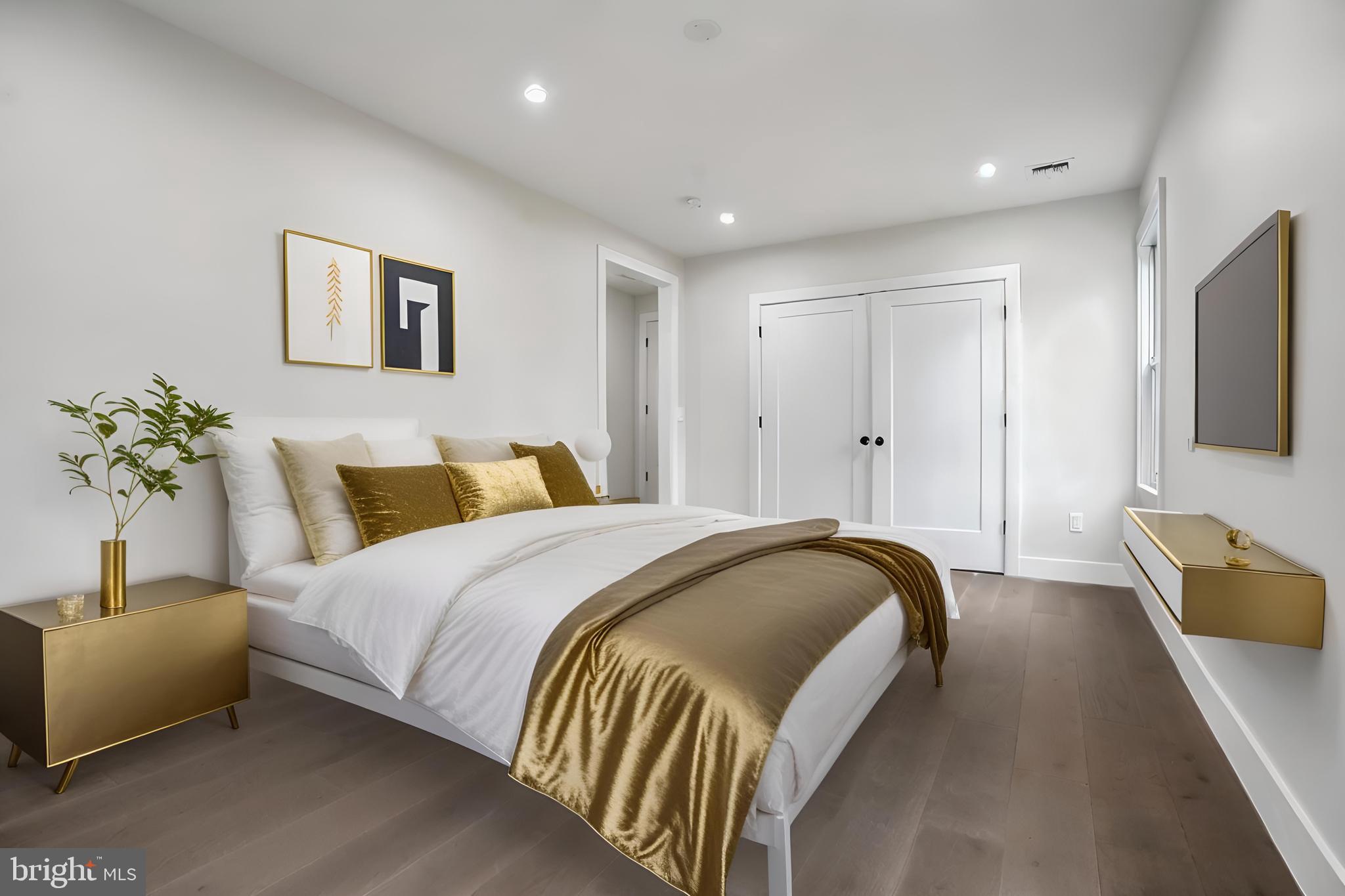 358 A Cherry Valley Road Princeton, NJ 08540 - Photo 20 of 28 a spacious bedroom with a bed and a couch