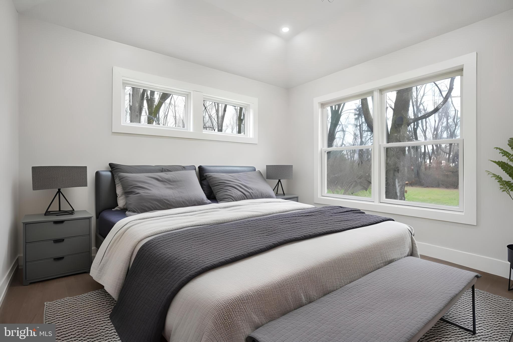 358 A Cherry Valley Road Princeton, NJ 08540 - Photo 23 of 28 a bed sitting in a bedroom next to a window