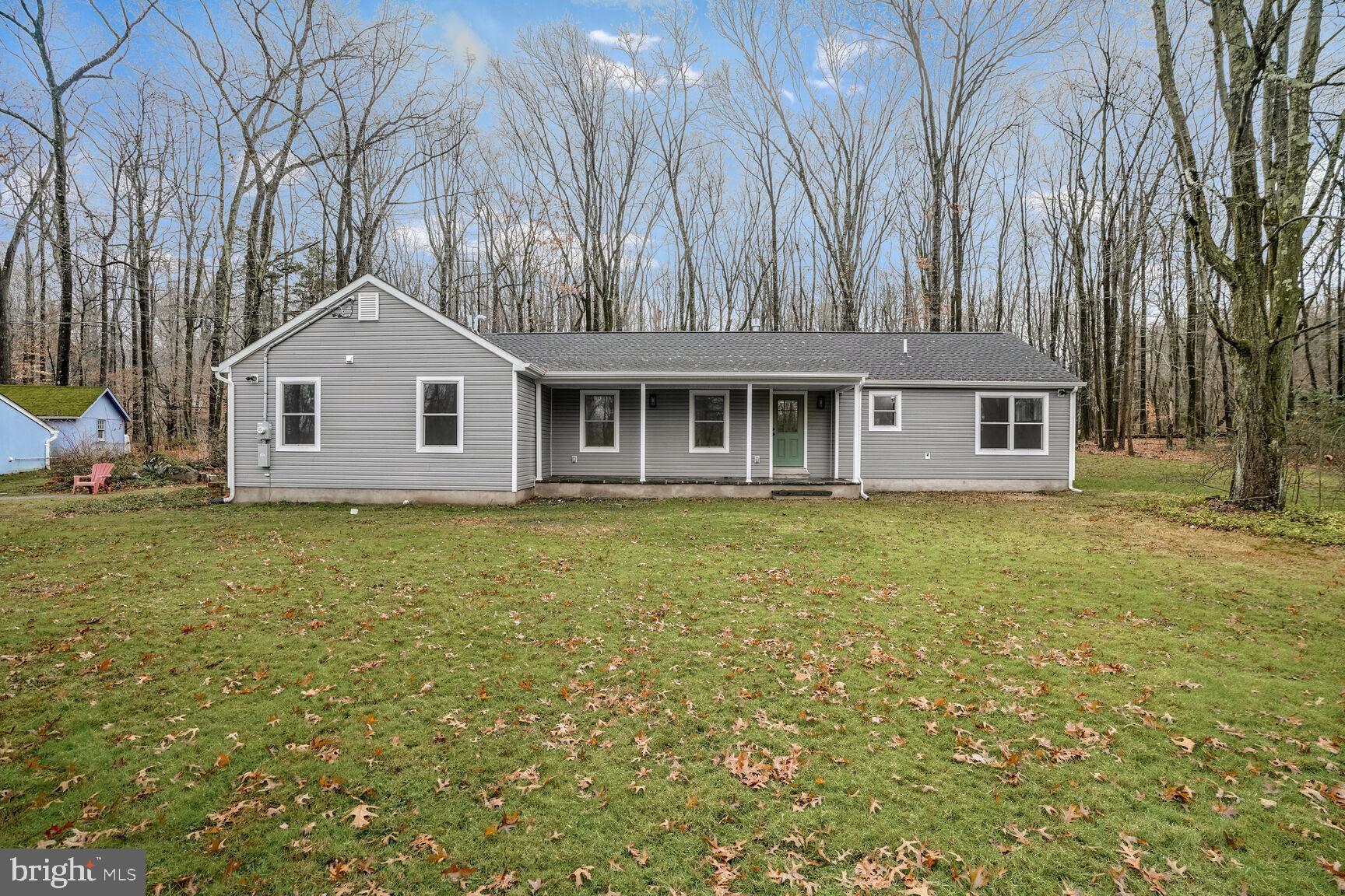 358 A Cherry Valley Road Princeton, NJ 08540 - Photo 27 of 28 a front view of a house with garden