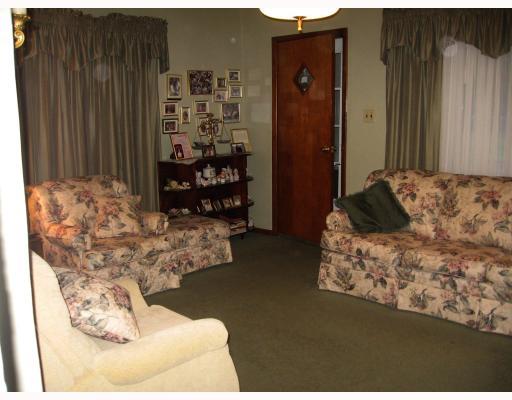 70-72 Ohio Street McKees Rocks, PA 15136 - Photo 3 of 13 Living Room. Livingroom including wall to wall and custom window treatments.