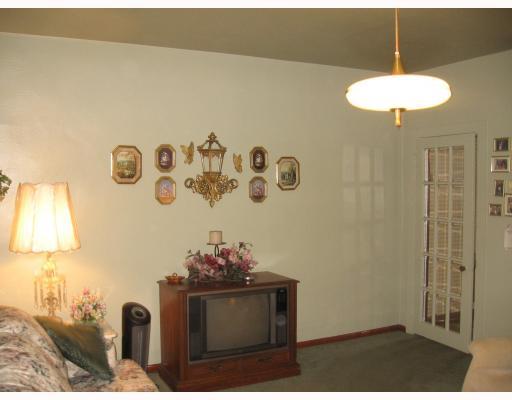 70-72 Ohio Street McKees Rocks, PA 15136 - Photo 4 of 13 Living Room. Living room showing french door to Kitchen.