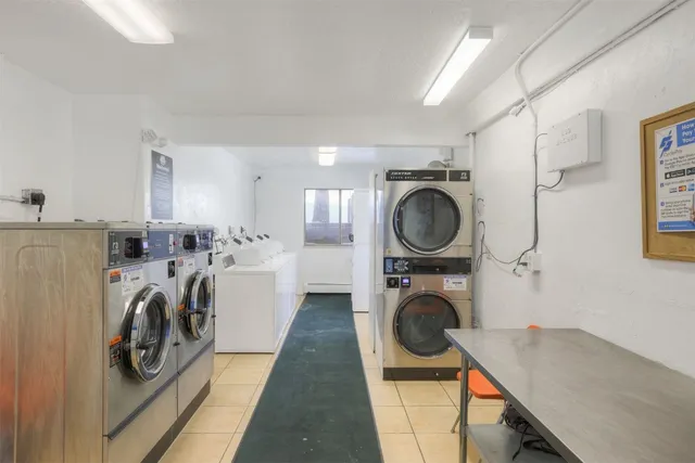 a view of a kitchen with washer and dryer
