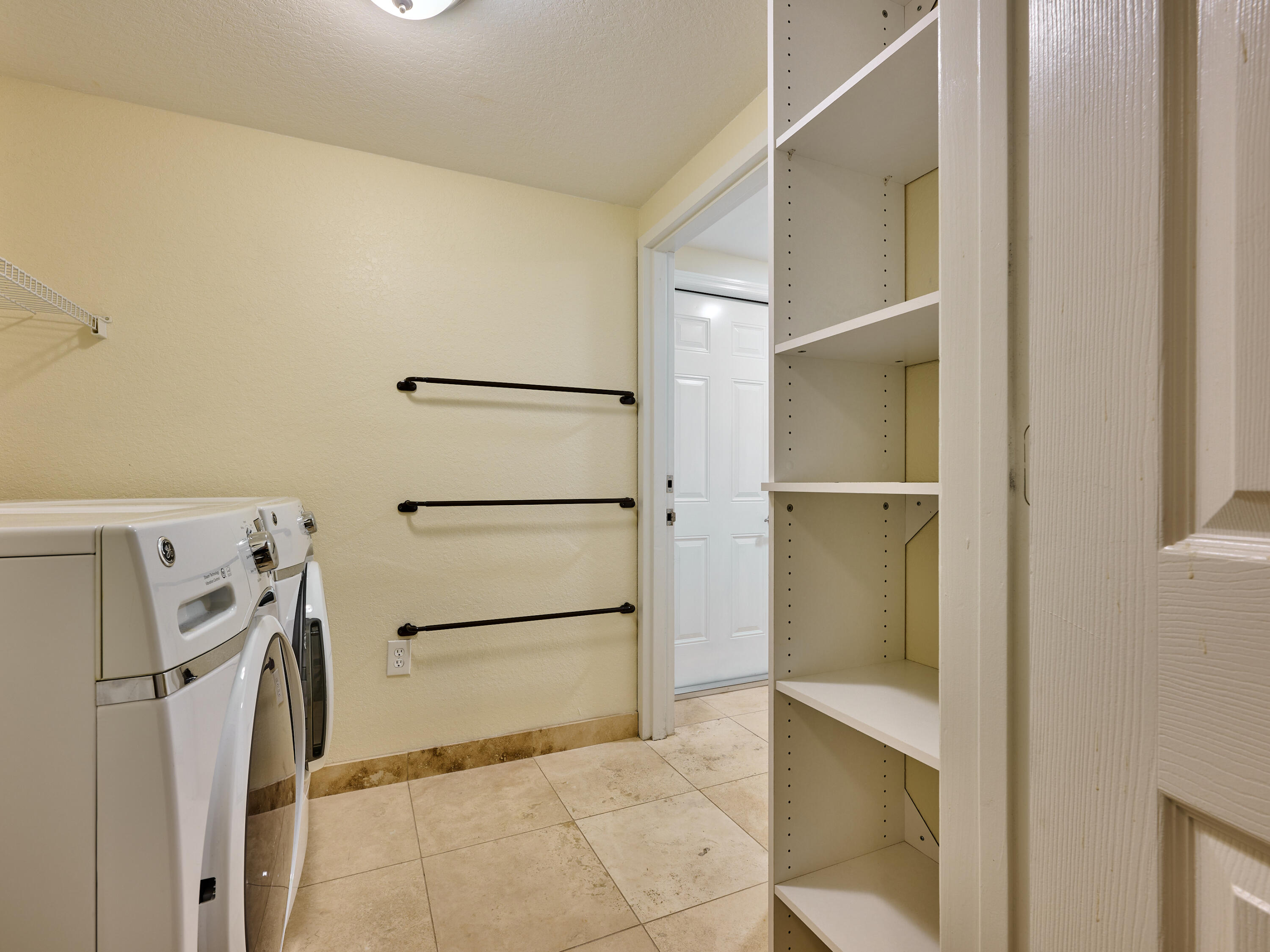 6344 West Sample Road, Unit 6344 Coral Springs, FL 33067 - Photo 16 of 30 a view of a walk in closet