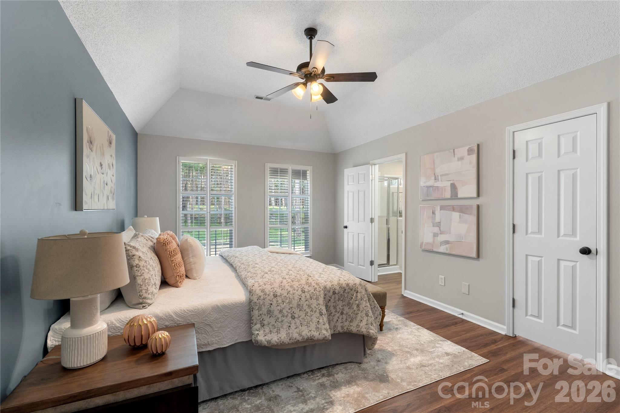 12028 Regent Ridge Lane Charlotte, NC 28278 - Photo 17 of 42 a bedroom with a bed and window