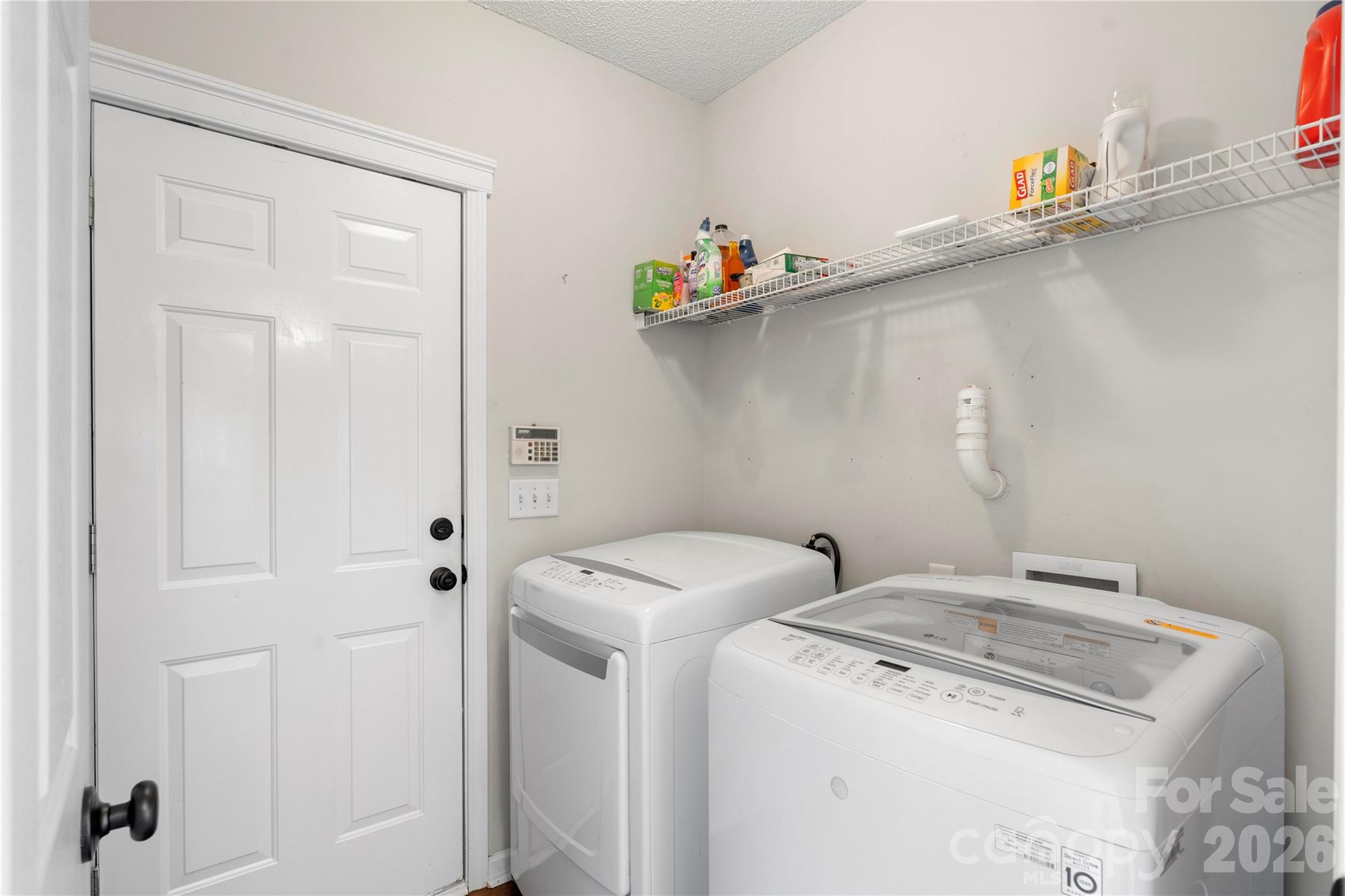 12028 Regent Ridge Lane Charlotte, NC 28278 - Photo 31 of 42 a utility room with dryer and washer