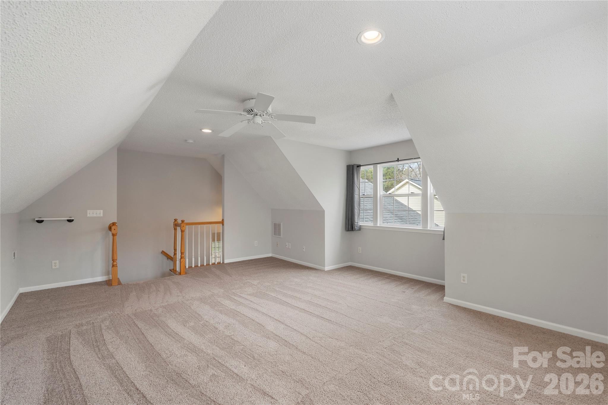 12028 Regent Ridge Lane Charlotte, NC 28278 - Photo 33 of 42 an empty room with a empty space and windows
