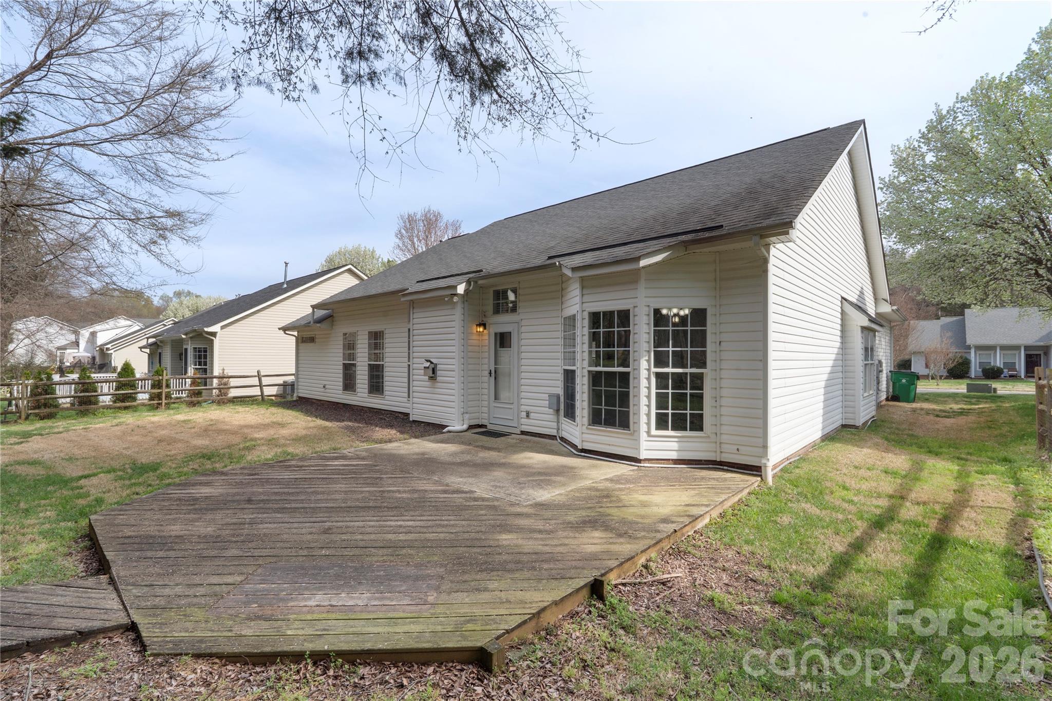 12028 Regent Ridge Lane Charlotte, NC 28278 - Photo 36 of 42 a view of a house with a yard