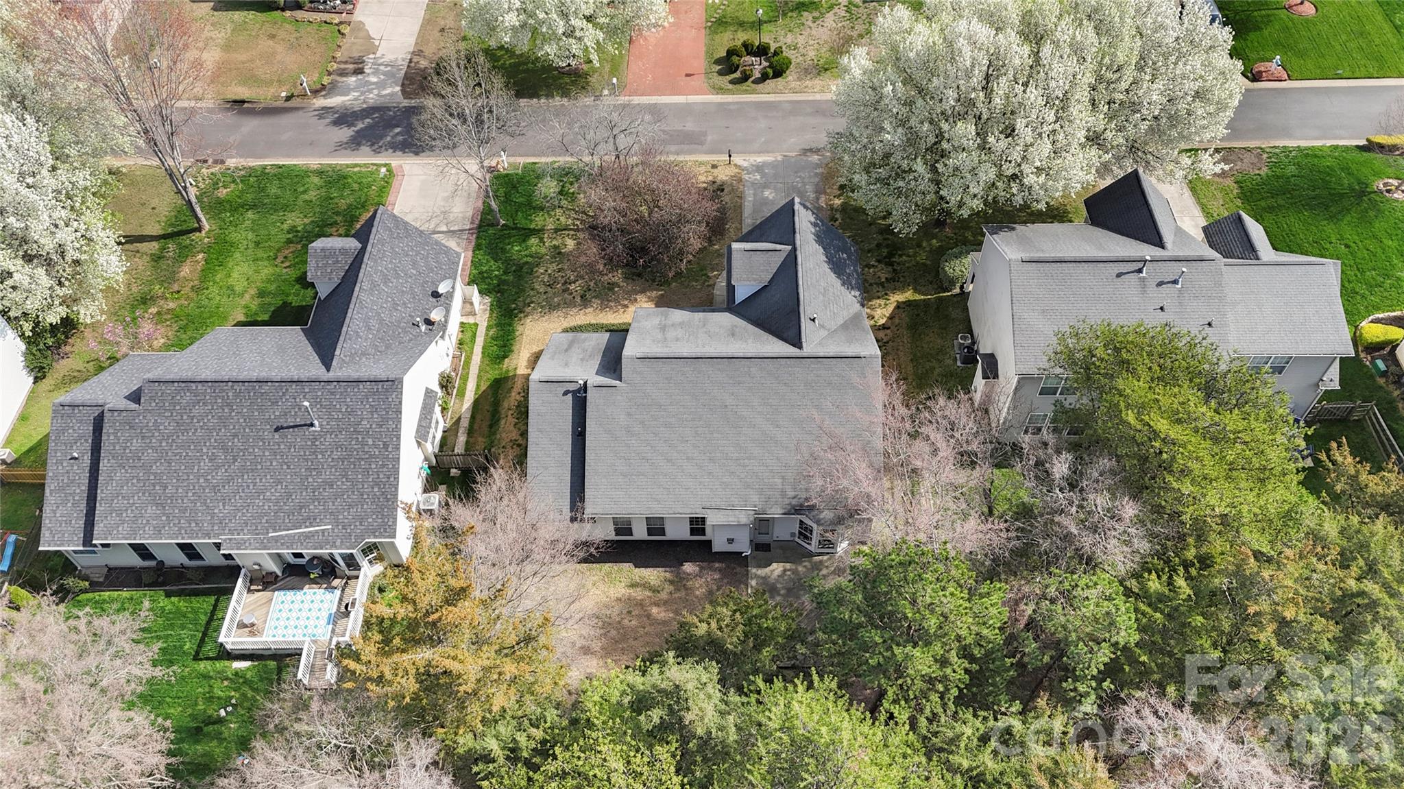 12028 Regent Ridge Lane Charlotte, NC 28278 - Photo 39 of 42 an aerial view of a house with a yard