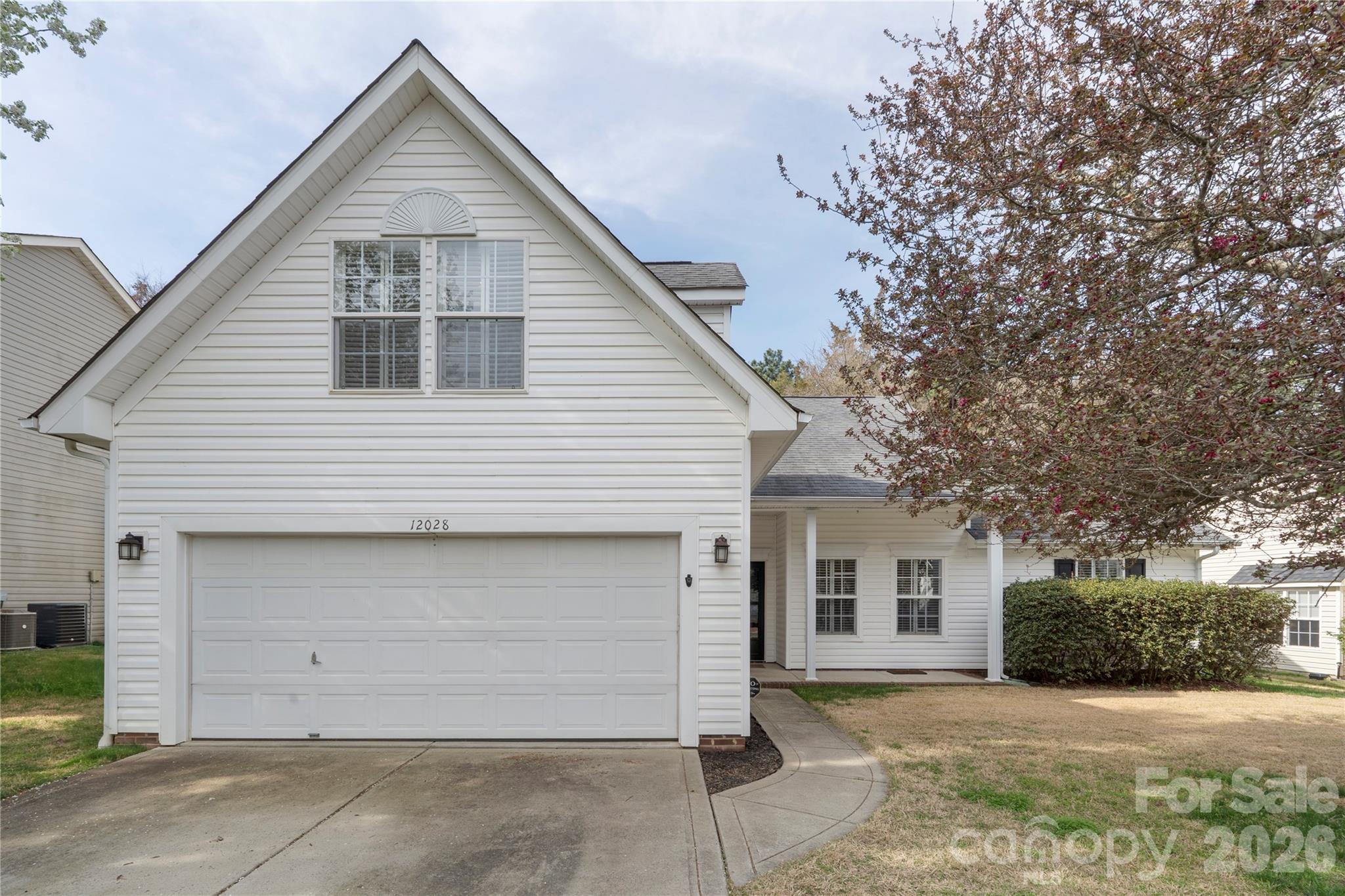 12028 Regent Ridge Lane Charlotte, NC 28278 - Photo 42 of 42 a view of a house with a yard