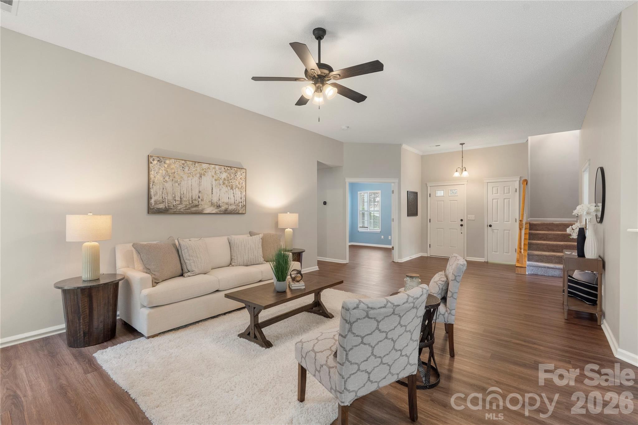 12028 Regent Ridge Lane Charlotte, NC 28278 - Photo 8 of 42 a living room with furniture and a wooden floor