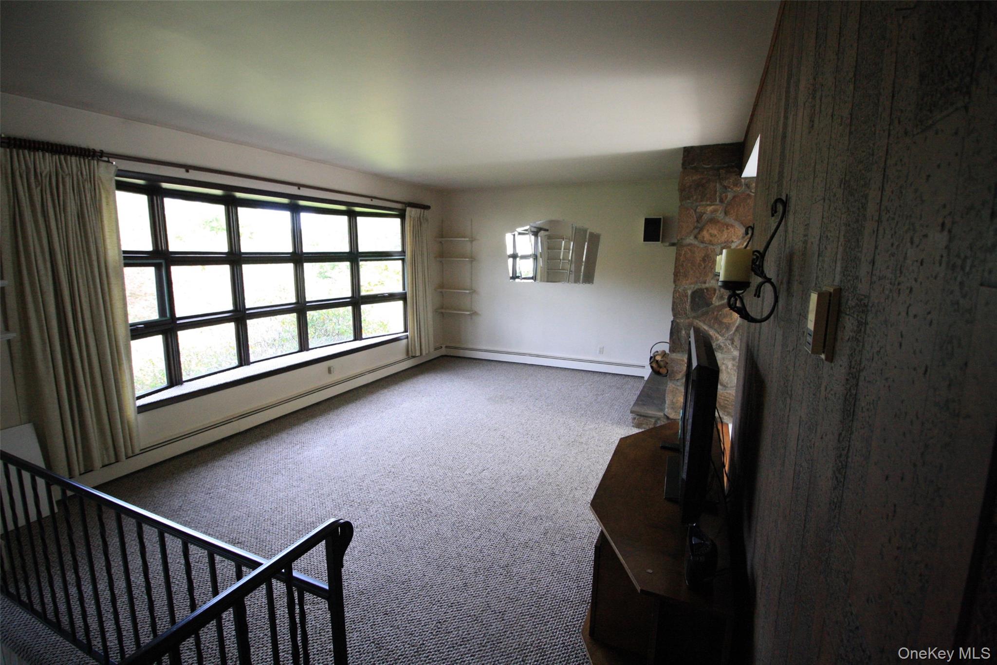 395 Mooney Hill Road Patterson, NY 12563 - Photo 12 of 26 a view of entryway with stairs and a window