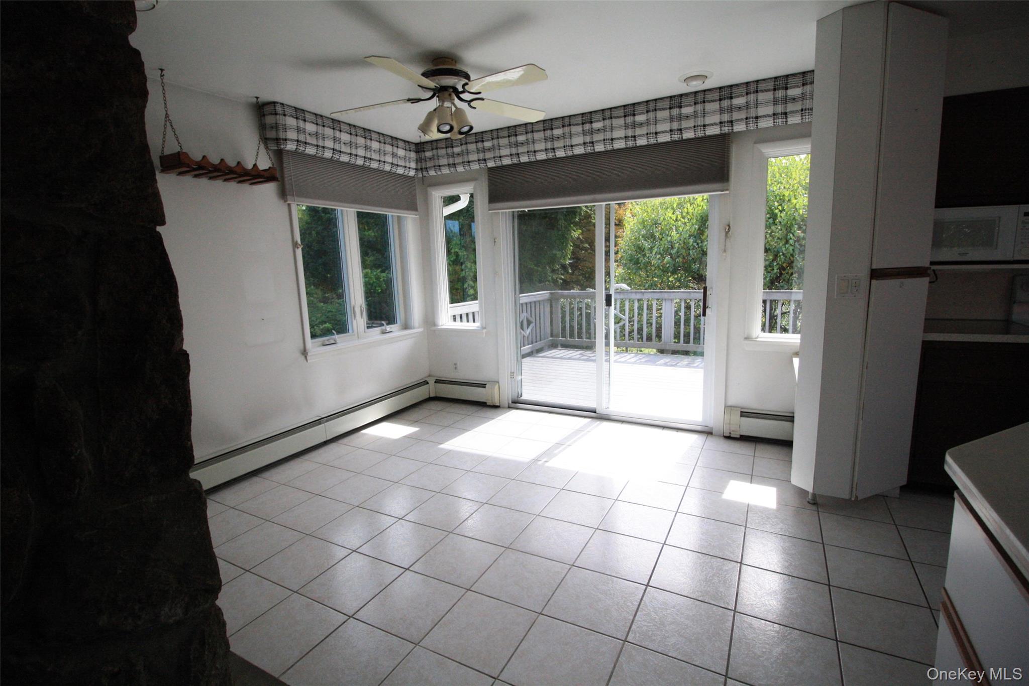 395 Mooney Hill Road Patterson, NY 12563 - Photo 16 of 26 a view of entryway with a floor to ceiling window and a livingroom