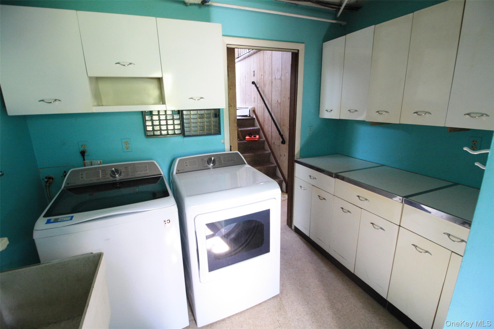 395 Mooney Hill Road Patterson, NY 12563 - Photo 10 of 26 a utility room with dryer and washer