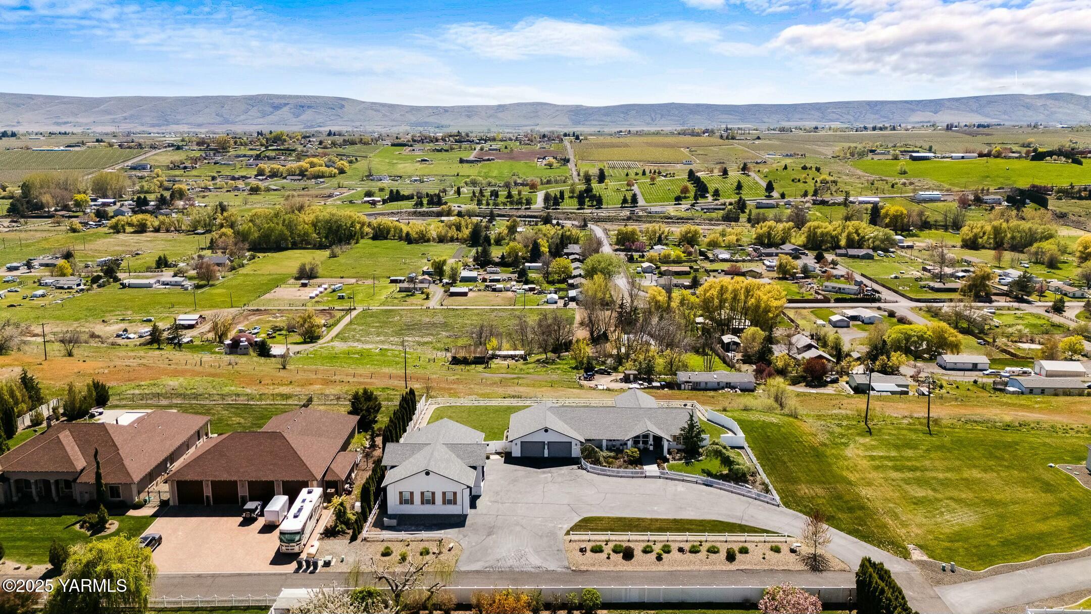 11906 West Barrett Road Yakima, WA 98908 - Photo 54 of 55 an aerial view of a residential building with outdoor space