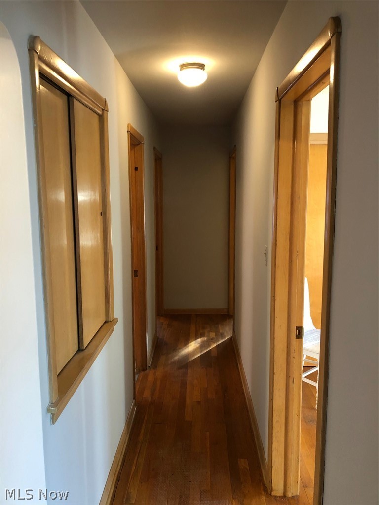 24800 Emery Road Warrensville Heights, OH 44128 - Photo 12 of 17 Hallway to bedrooms and bathroom with storage area on right