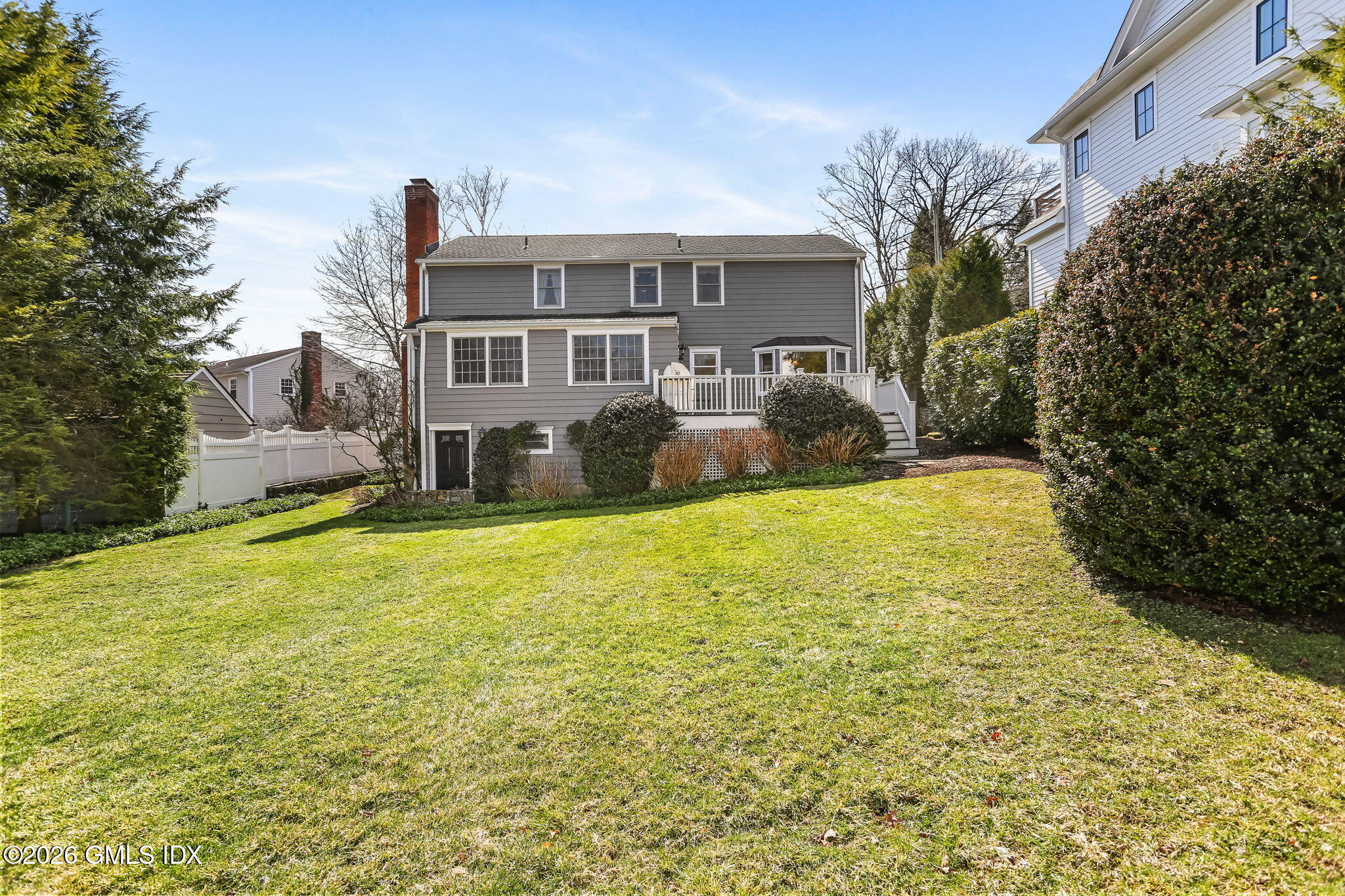 153 Lockwood Road Riverside, CT 06878 - Photo 49 of 58 a house view with swimming pool in front of it