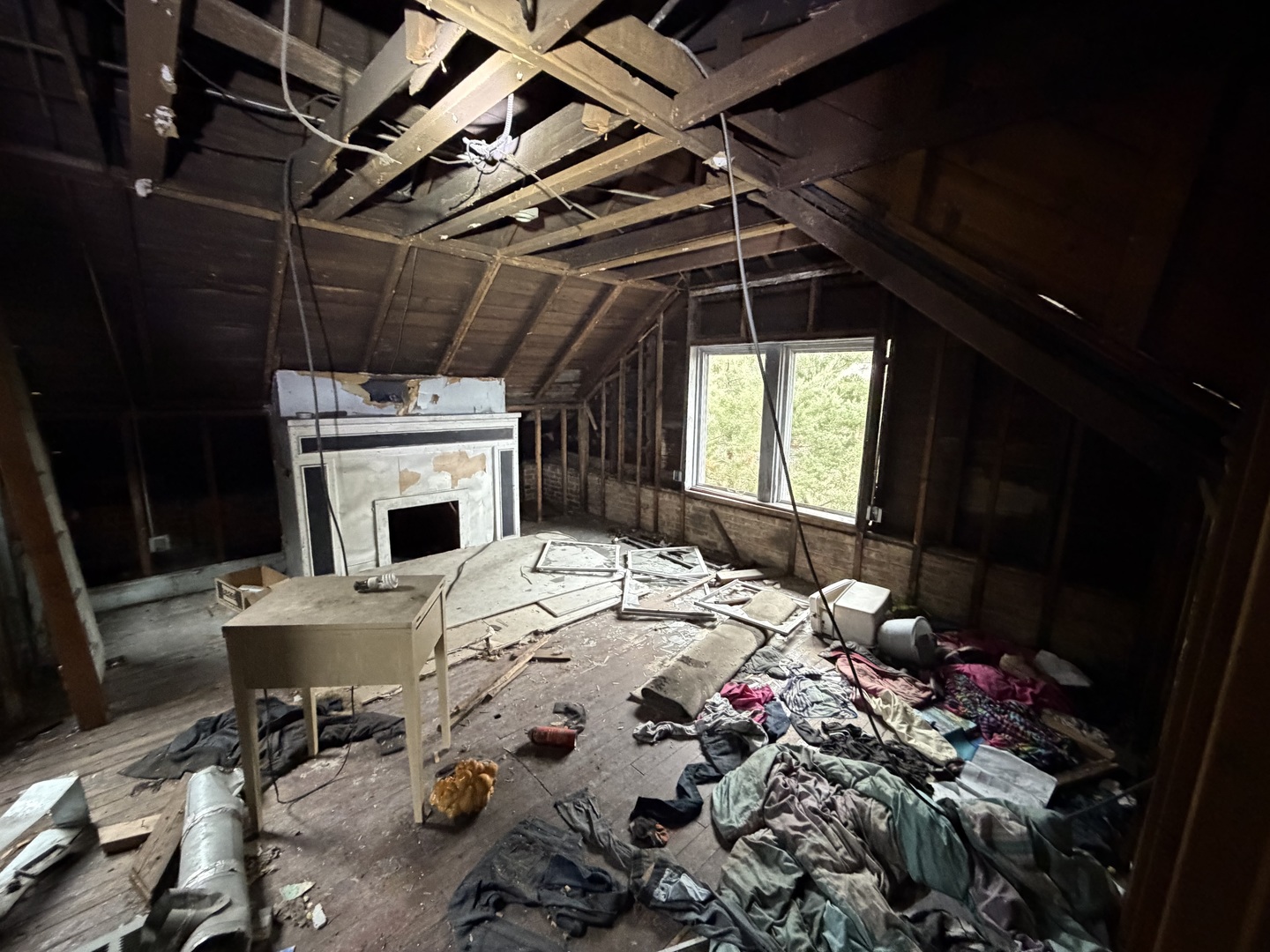 7927 South Colfax Avenue Chicago, IL 60617 - Photo 7 of 10 a bed sitting in a bedroom next to a window