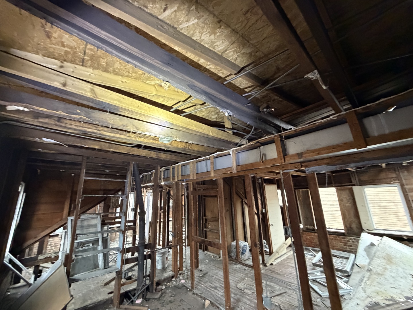 7927 South Colfax Avenue Chicago, IL 60617 - Photo 10 of 10 a view of an empty room with wooden floor
