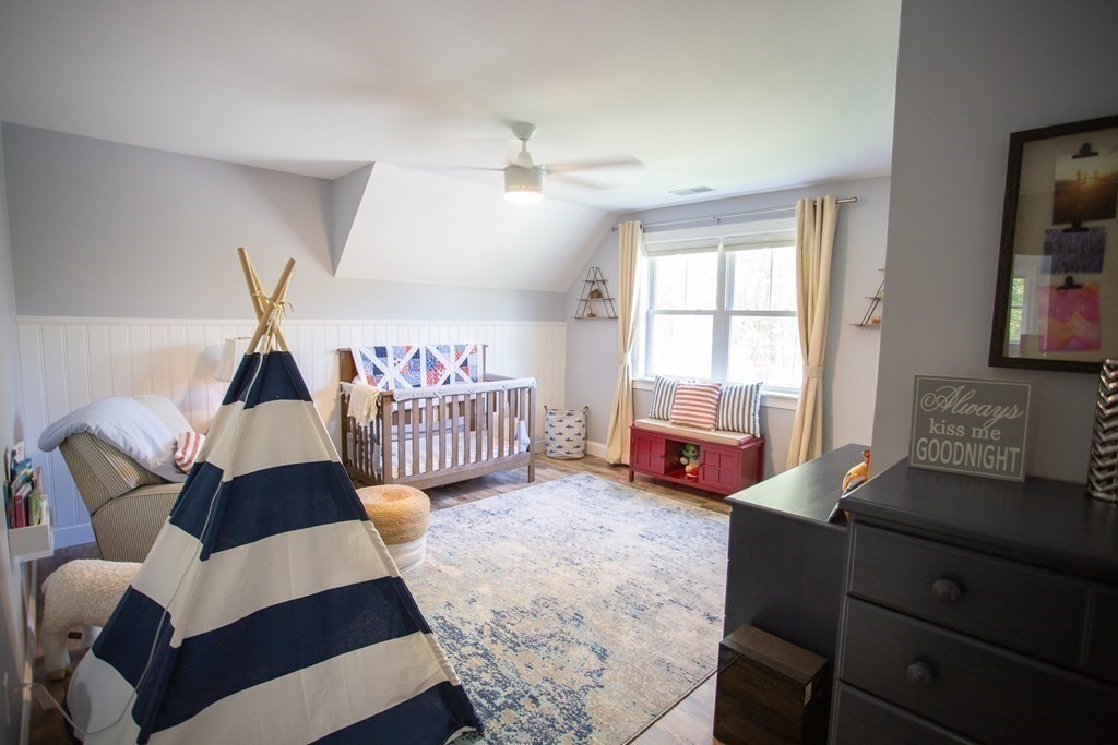 46 True Road Salisbury, MA 01952 - Photo 15 of 25 a bedroom with furniture and a window
