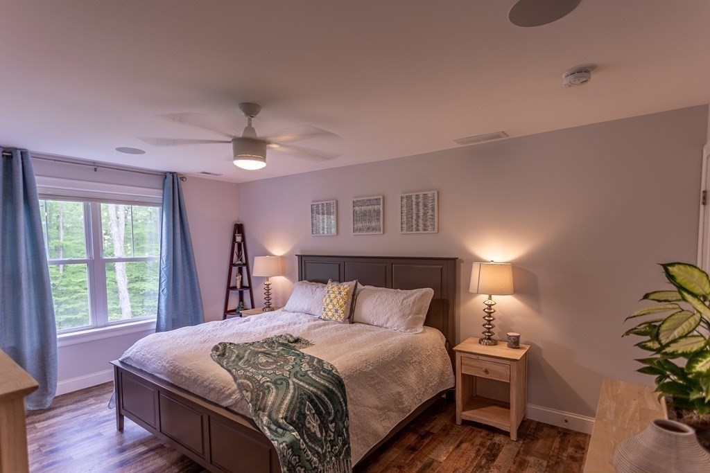 46 True Road Salisbury, MA 01952 - Photo 19 of 25 a bedroom with a bed and a window