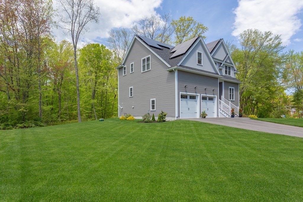 46 True Road Salisbury, MA 01952 - Photo 3 of 25 a view of a house with backyard and garden