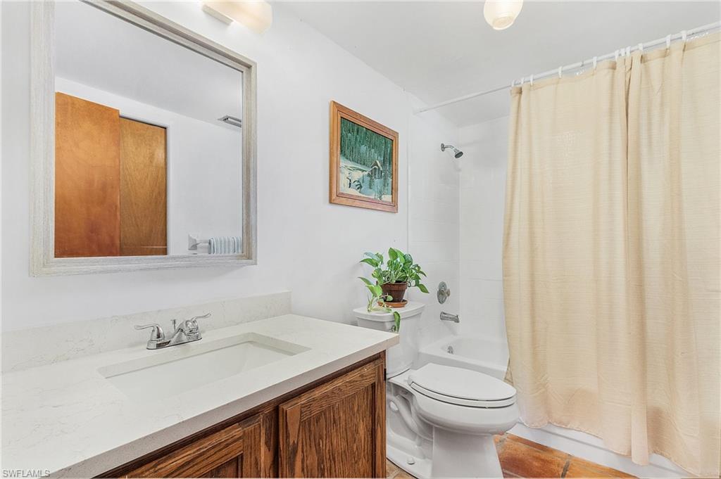 480 9th Street Southwest Naples, FL 34117 - Photo 8 of 11 UPDATED BATH WITH NEW QUARTZ COUNTER