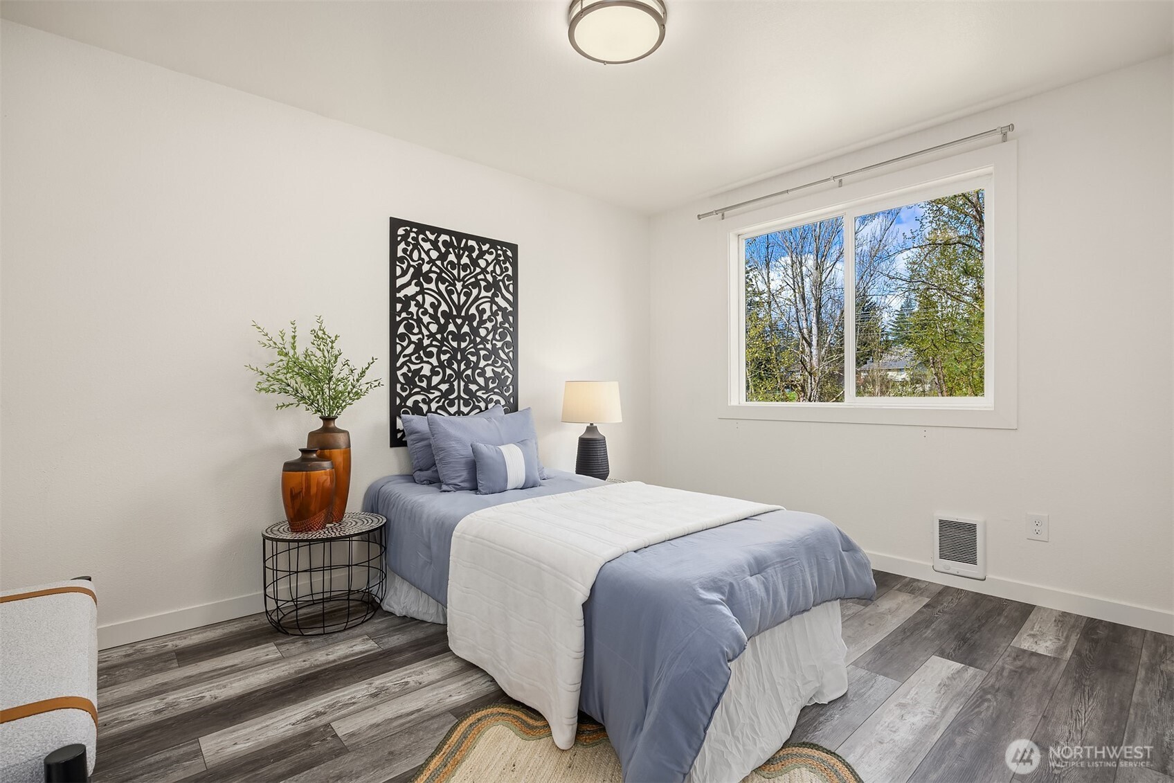 2208 182nd Street Southeast Bothell, WA 98012 - Photo 17 of 24 a bedroom with a bed and a window