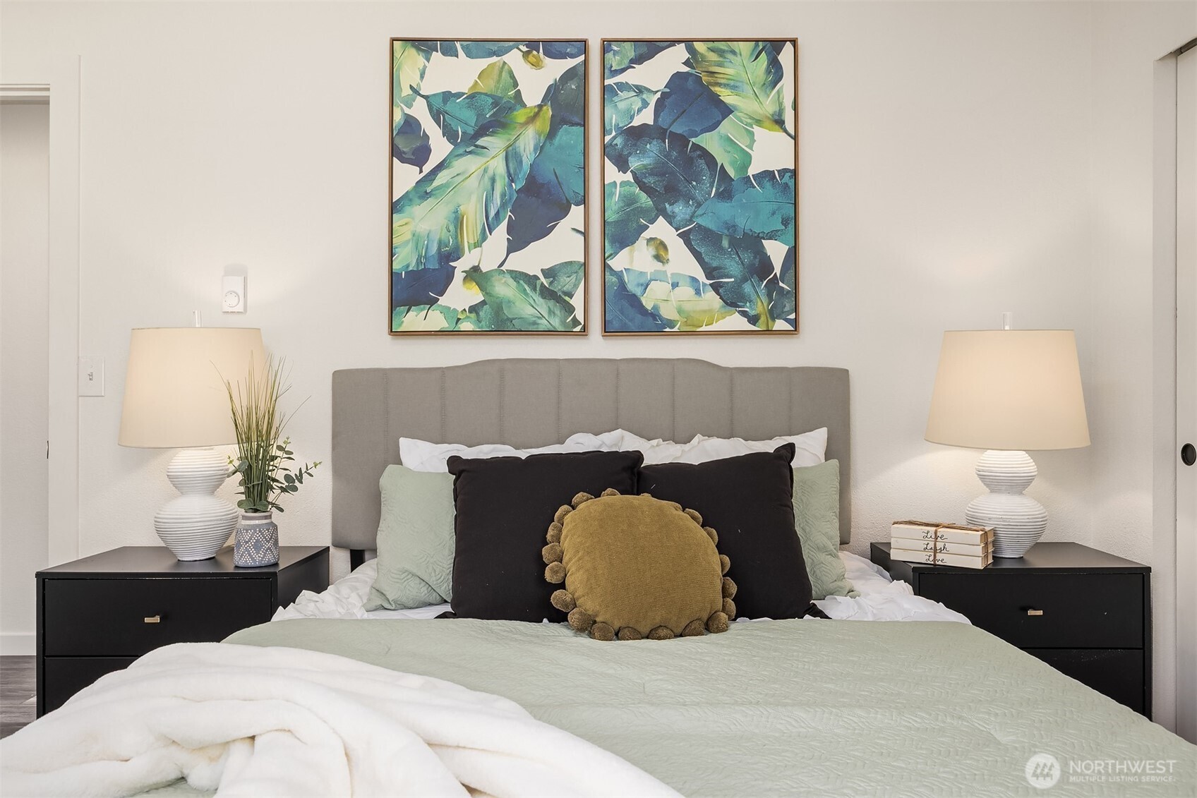 2208 182nd Street Southeast Bothell, WA 98012 - Photo 19 of 24 a bedroom with a bed and a painting on the wall