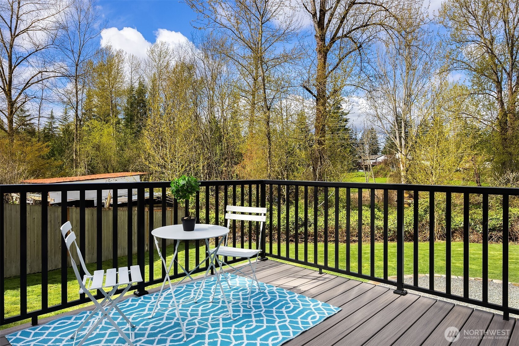 2208 182nd Street Southeast Bothell, WA 98012 - Photo 10 of 24 a view of a two chairs on the roof deck