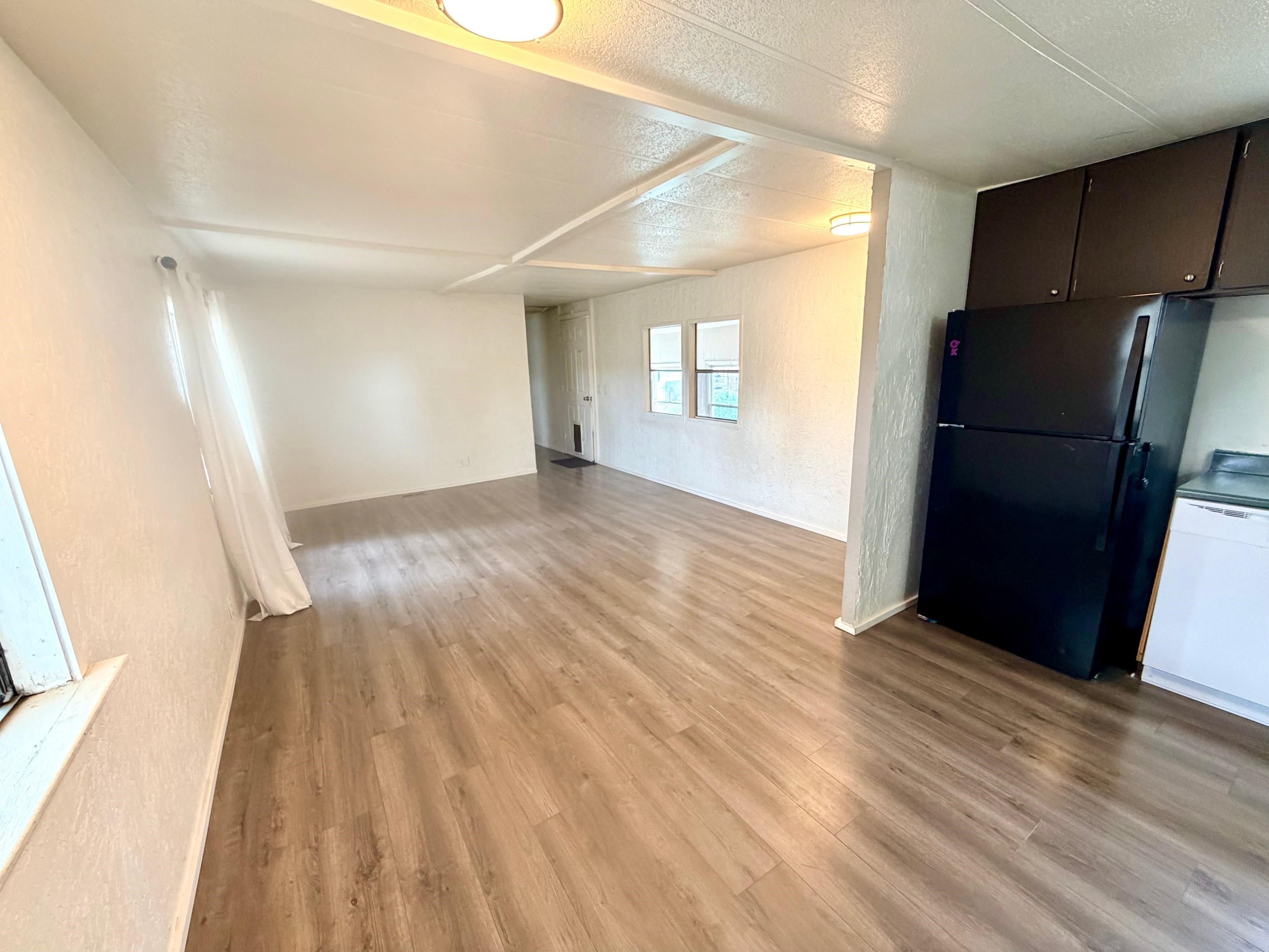 585-25 25 1/2 Road, Unit 237 Grand Junction, CO 81505 - Photo 14 of 31 a view of empty room with wooden floor