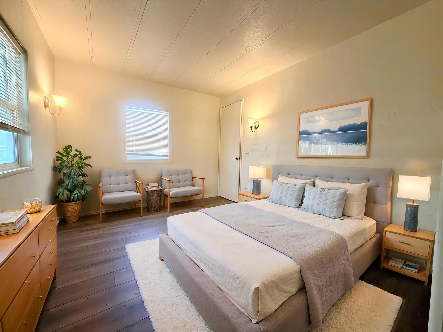 585-25 25 1/2 Road, Unit 237 Grand Junction, CO 81505 - Photo 22 of 31 a spacious bedroom with a bed and a couch