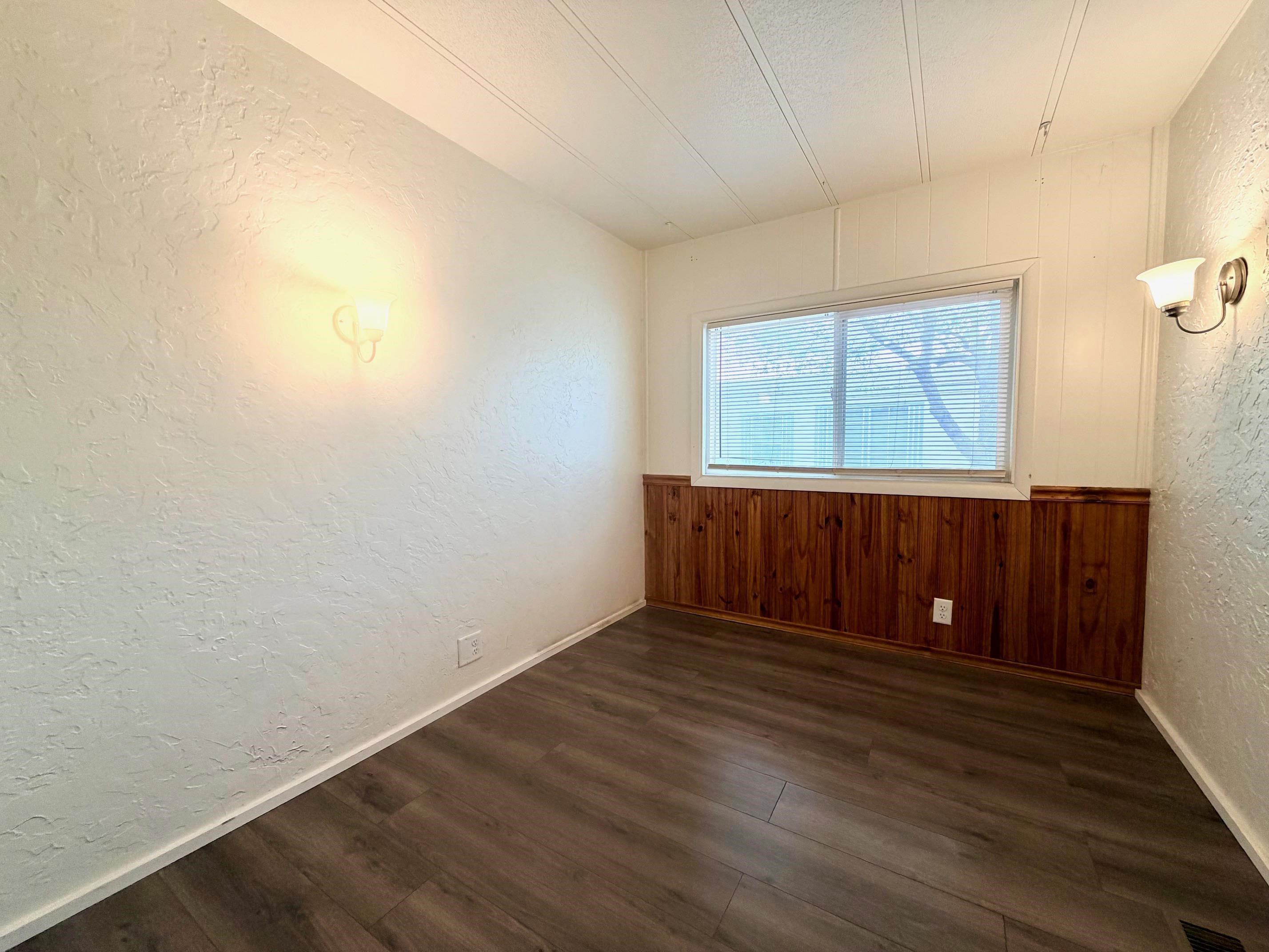 585-25 25 1/2 Road, Unit 237 Grand Junction, CO 81505 - Photo 23 of 31 a view of a room with wooden floor and window