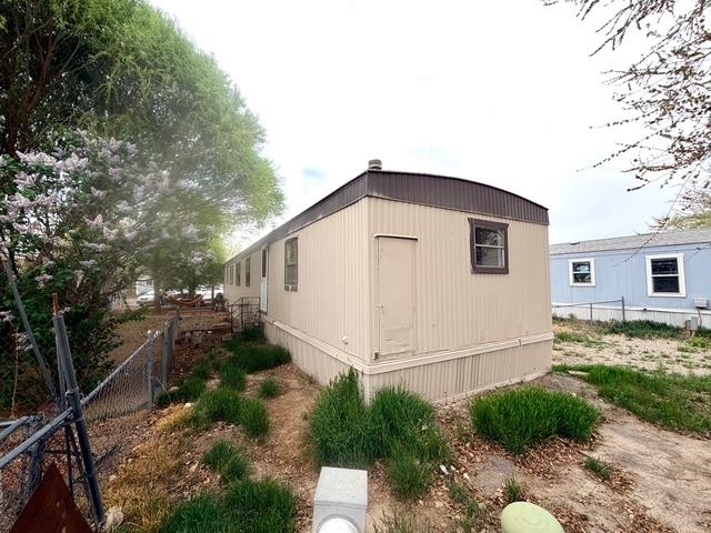 585-25 25 1/2 Road, Unit 237 Grand Junction, CO 81505 - Photo 4 of 31 a view of a house with backyard