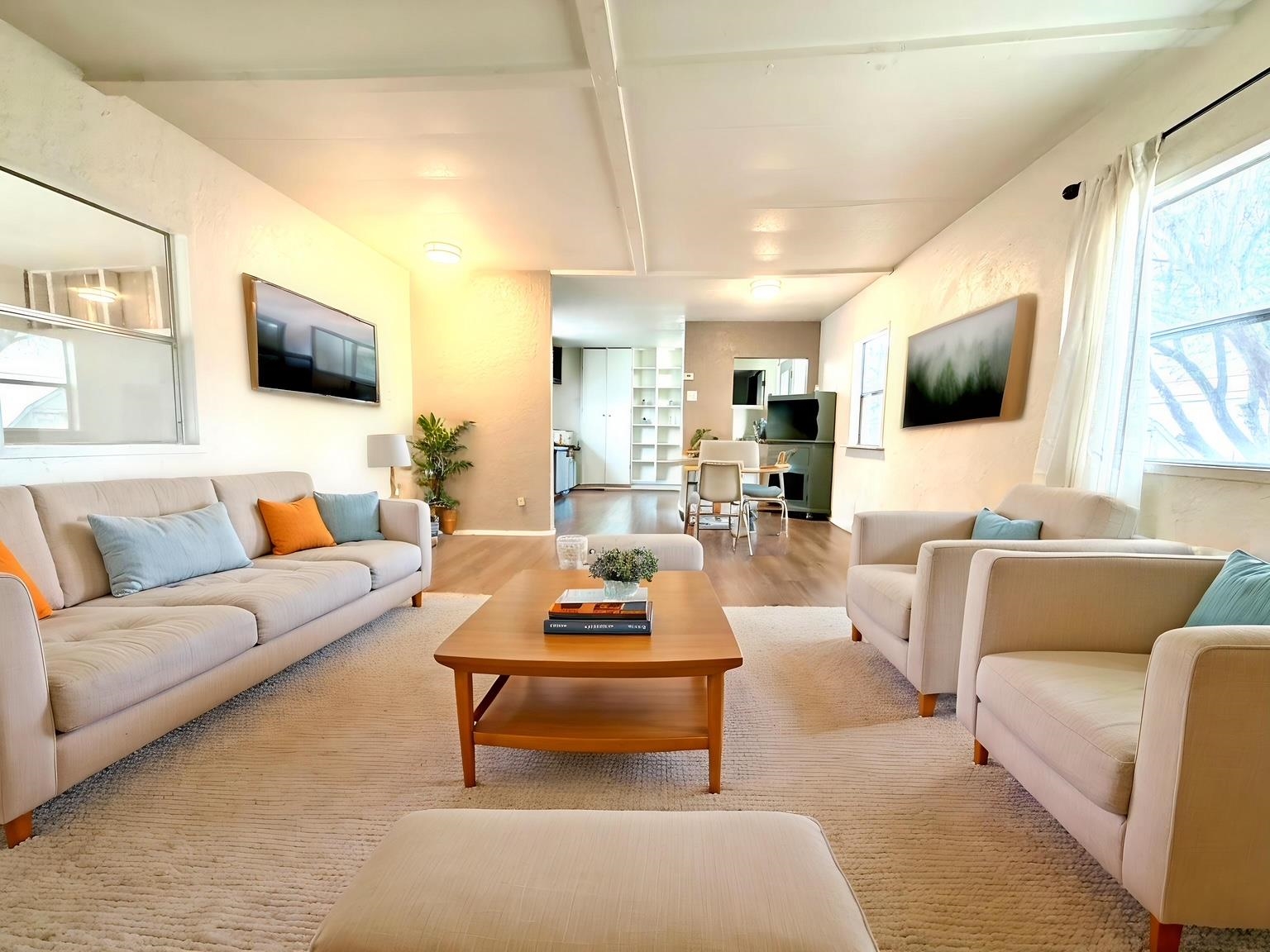 585-25 25 1/2 Road, Unit 237 Grand Junction, CO 81505 - Photo 6 of 31 a living room with furniture and a flat screen tv