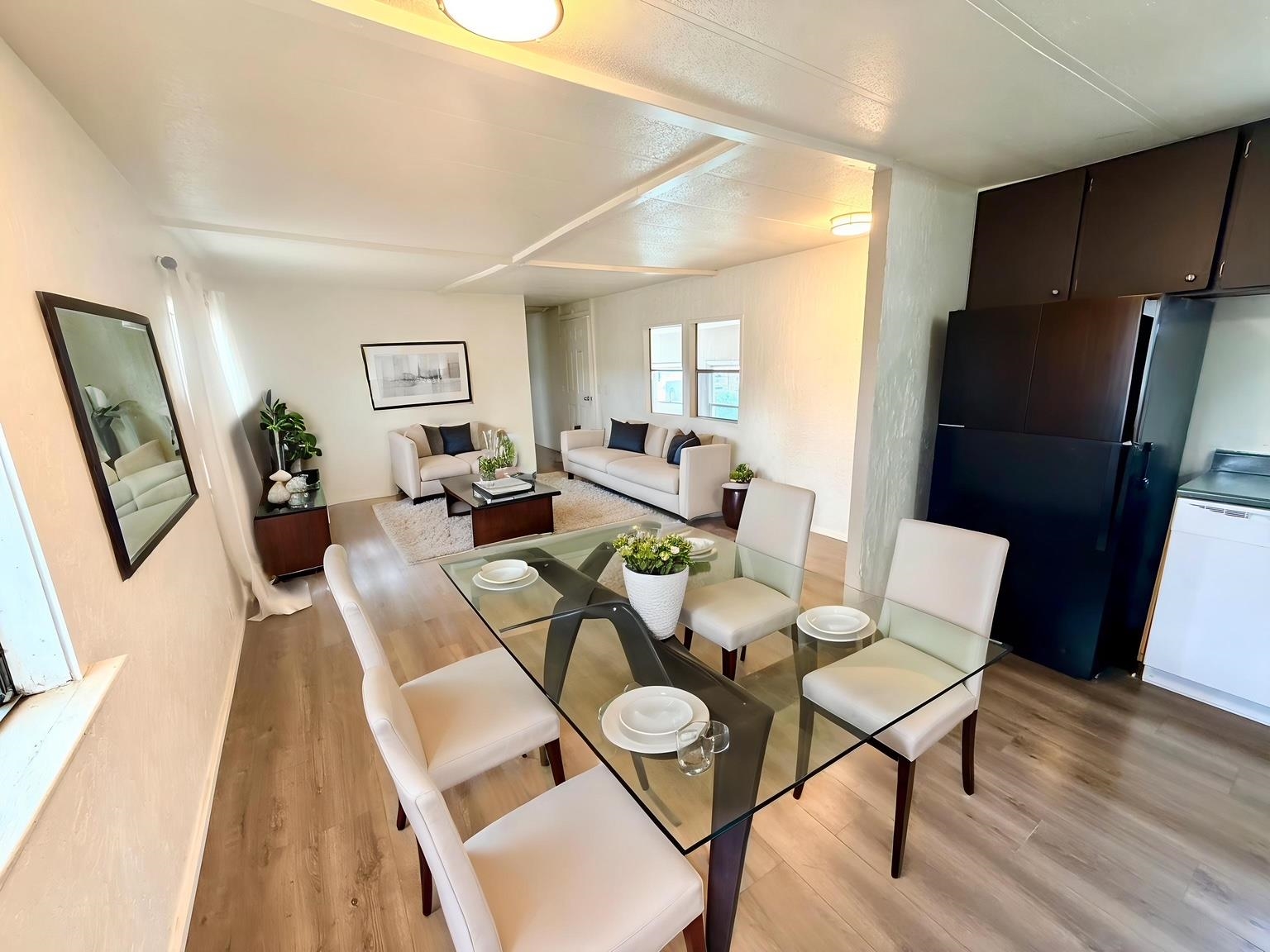 585-25 25 1/2 Road, Unit 237 Grand Junction, CO 81505 - Photo 9 of 31 a living room with furniture and wooden floor