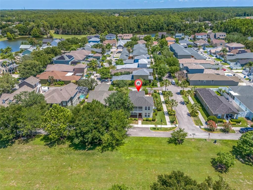 10121 Porch Street New Port Richey, FL 34655 - Photo 46 of 57 an aerial view of residential houses with outdoor space and street view
