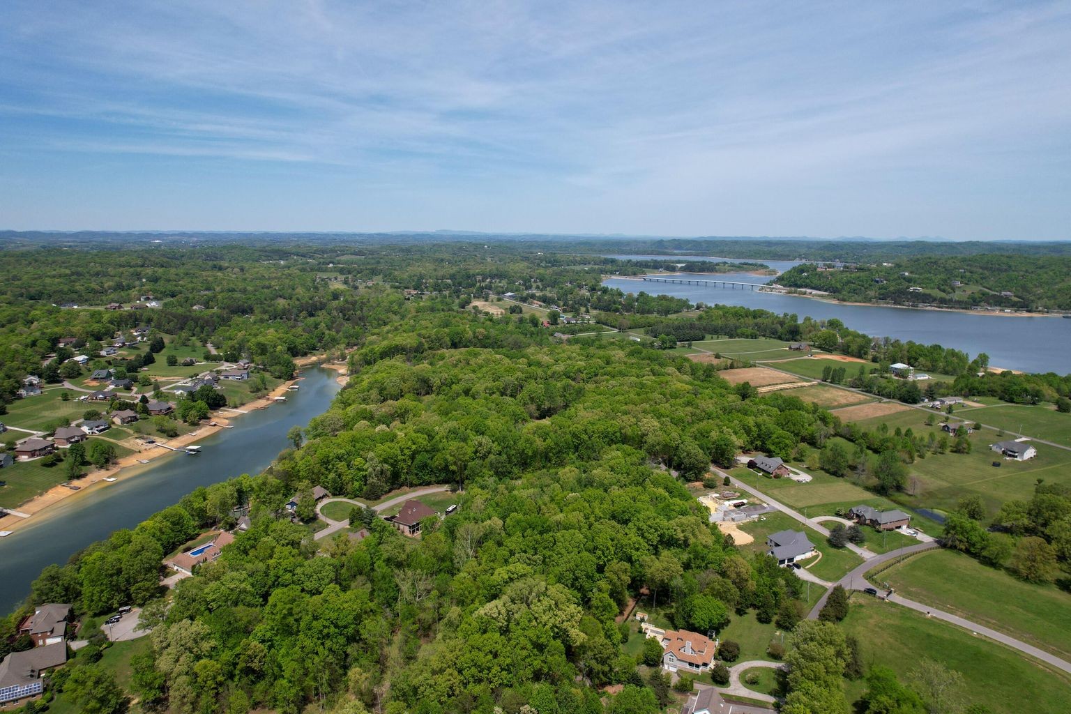 37 McCorkle Road White Pine, TN 37890 - Photo 17 of 21 an aerial view of a city with lots of residential buildings and mountain view in back