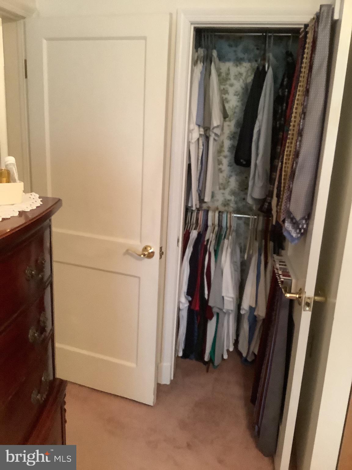1902 Barry Road Baltimore, MD 21222 - Photo 23 of 34 a view of walk in closet with clothes