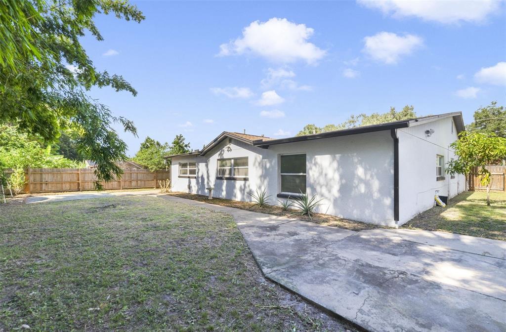 449 Citadel Drive Altamonte Springs, FL 32714 - Photo 16 of 25 a view of a house with a yard