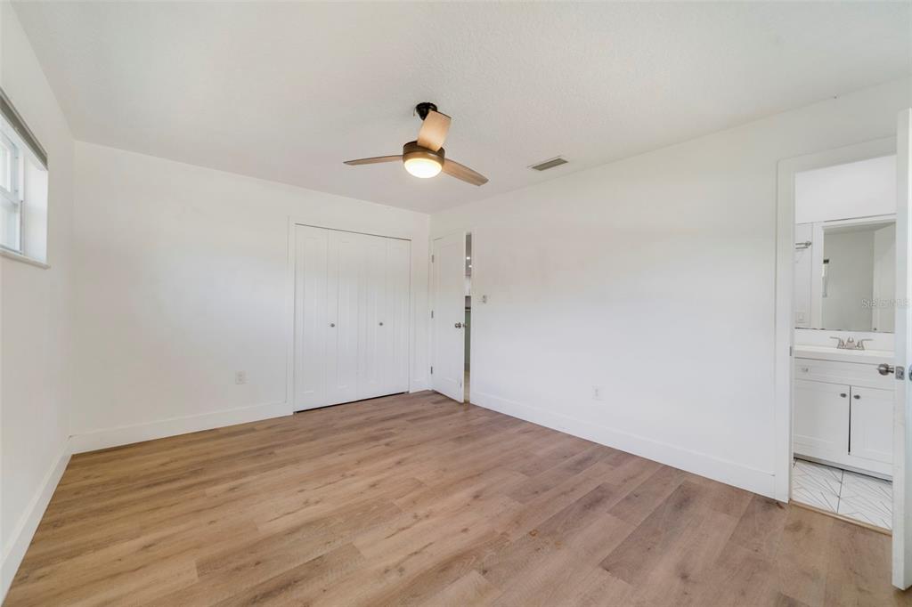 449 Citadel Drive Altamonte Springs, FL 32714 - Photo 8 of 25 a view of empty room with wooden floor