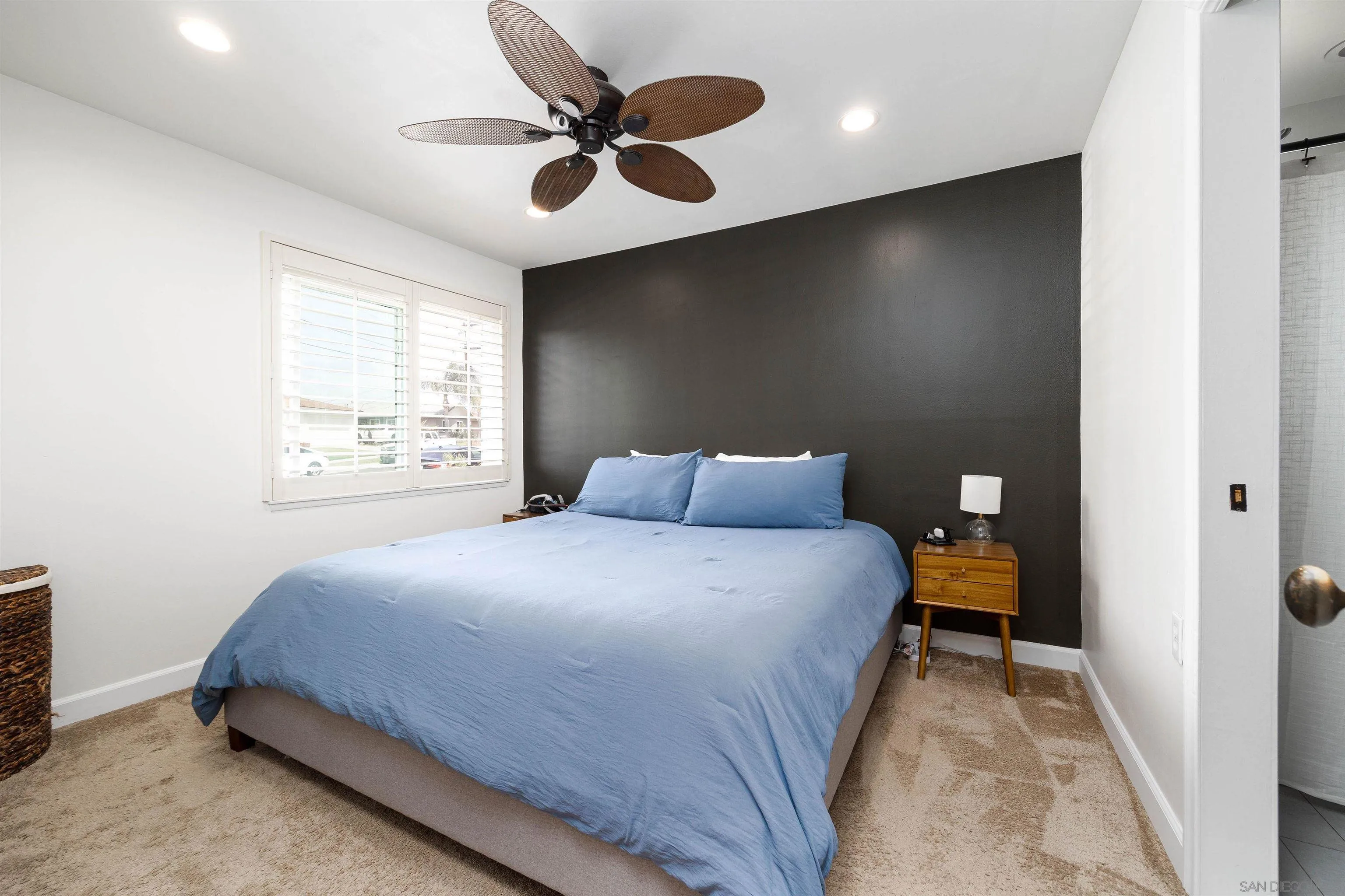 5775 Derk Drive La Mesa, CA 91942 - Photo 13 of 21 a bed room with a bed and a large window