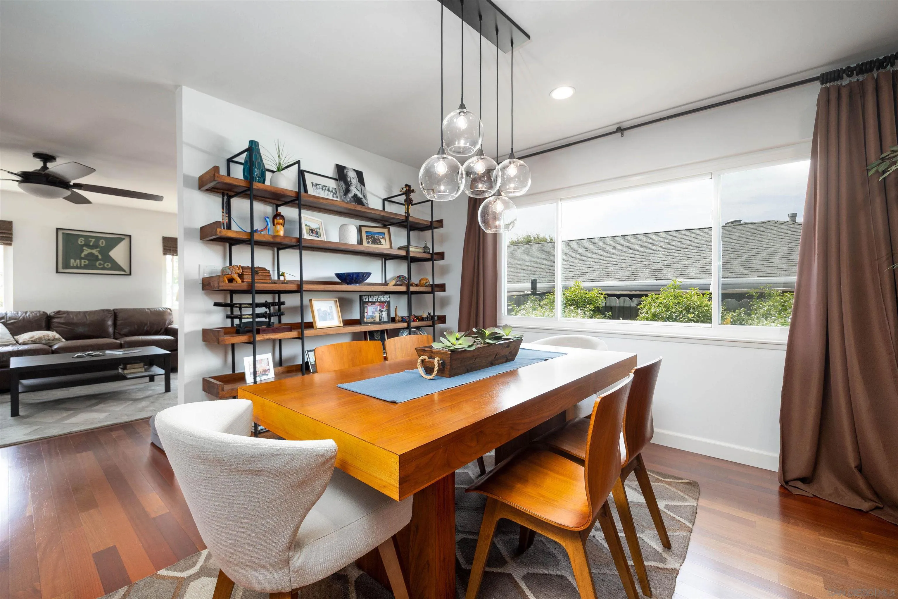 5775 Derk Drive La Mesa, CA 91942 - Photo 4 of 21 a view of a dining room with furniture window and wooden floor