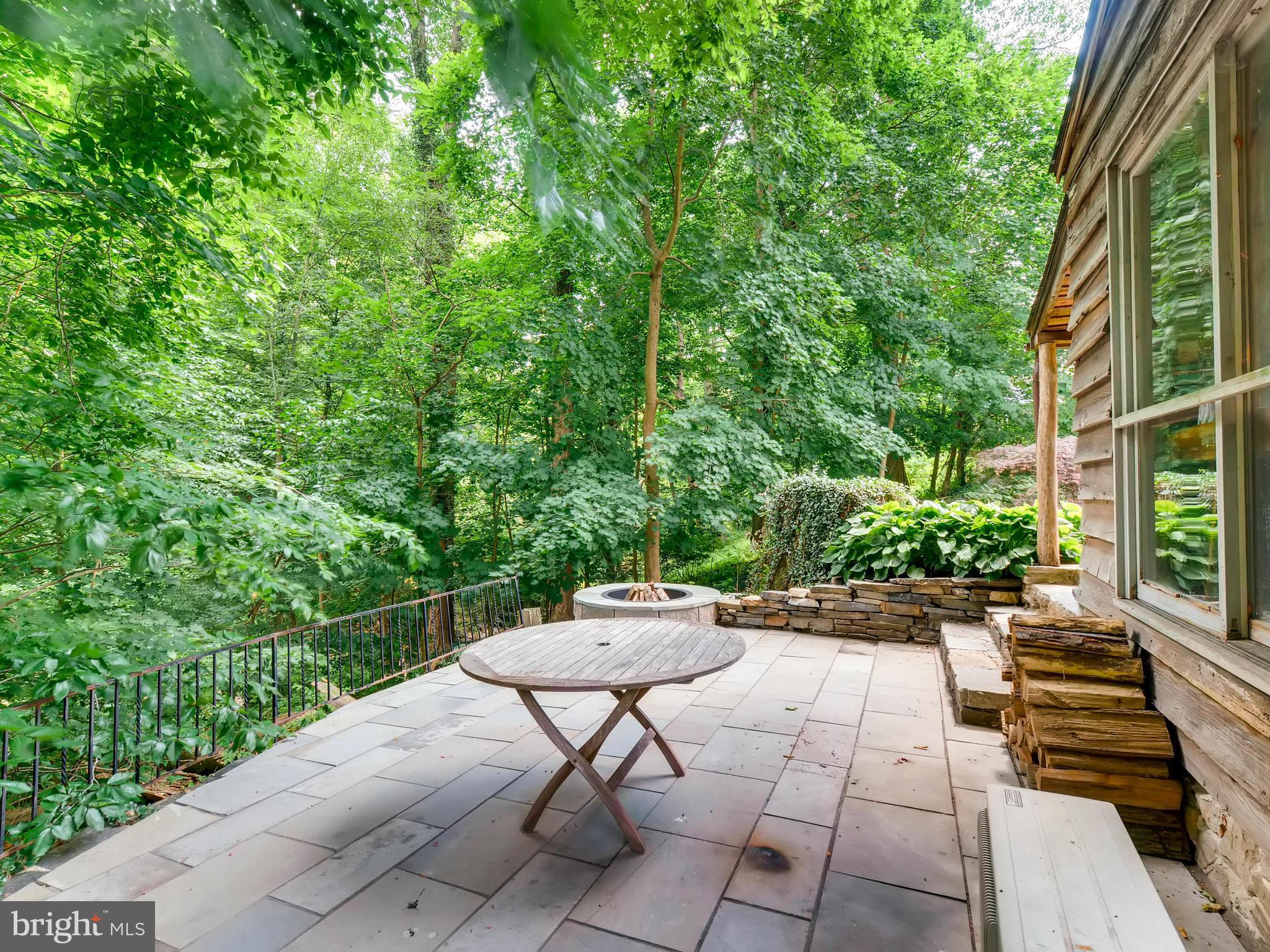 1201 Berwick Road Baltimore, MD 21204 - Photo 29 of 30 Terrace with fire pit at log cabin