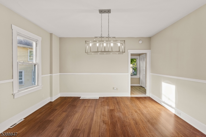 330 Chambers Street Phillipsburg, NJ 08865 - Photo 11 of 27 a view of empty room with wooden floor fan and window