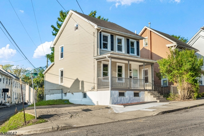 330 Chambers Street Phillipsburg, NJ 08865 - Photo 4 of 27 a front view of a house with a yard