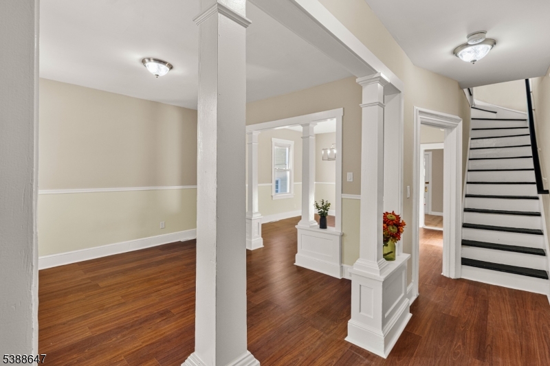 330 Chambers Street Phillipsburg, NJ 08865 - Photo 6 of 27 a view of a hallway with wooden floor and dining room view