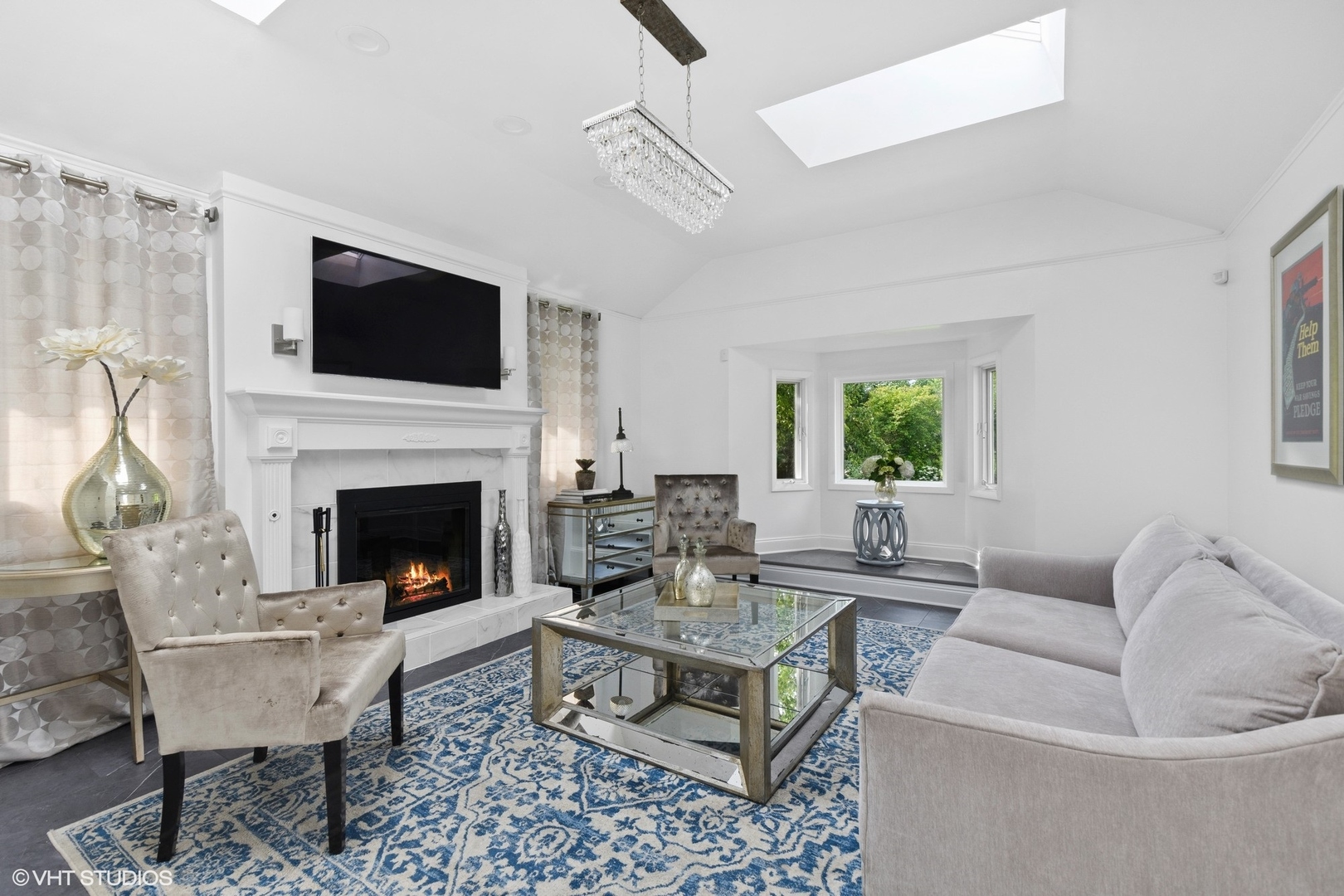 590 Old Elm Road Highland Park, IL 60035 - Photo 12 of 28 a living room with furniture a flat screen tv and a fireplace