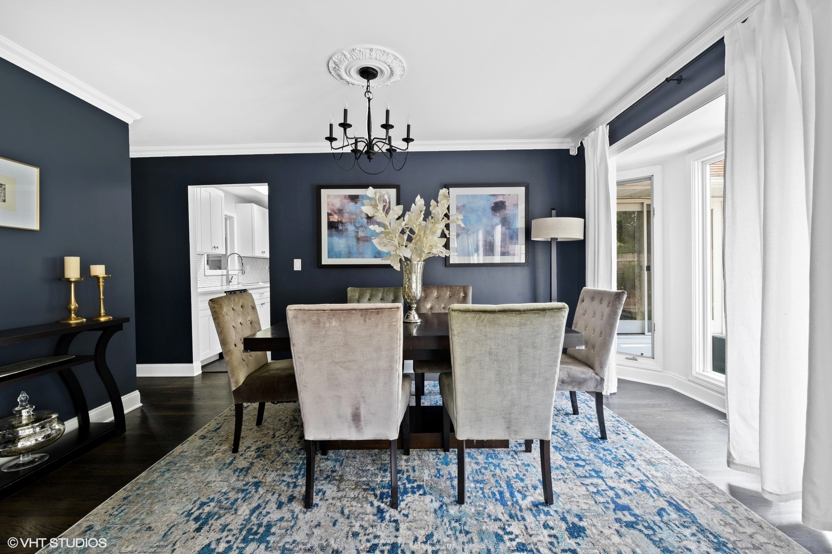 590 Old Elm Road Highland Park, IL 60035 - Photo 14 of 28 a view of a dining room with furniture a rug and wooden floor