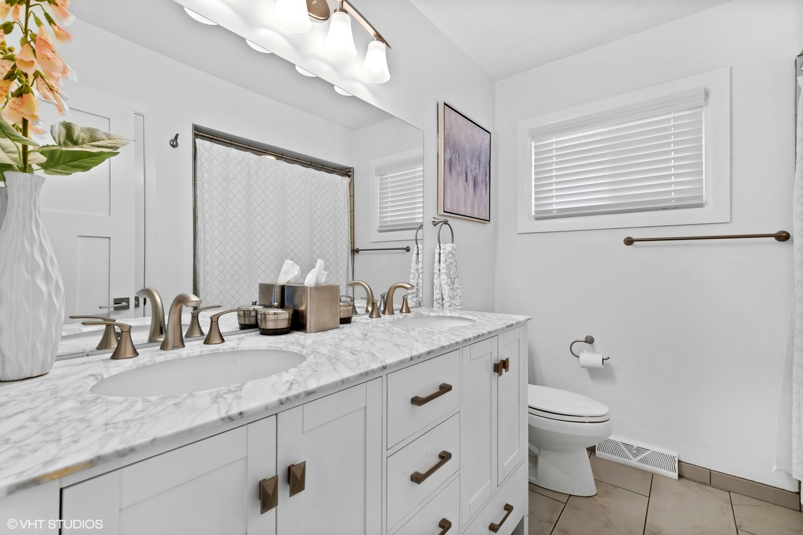 590 Old Elm Road Highland Park, IL 60035 - Photo 17 of 28 a bathroom with a granite countertop sink a toilet and a mirror