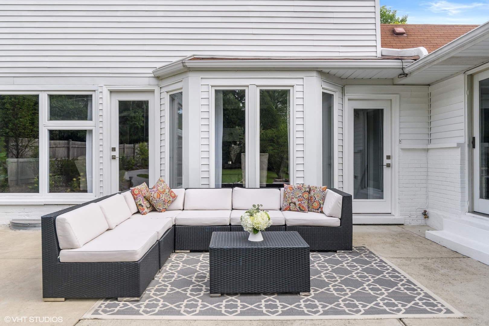 590 Old Elm Road Highland Park, IL 60035 - Photo 27 of 28 a view of a patio with couches and a potted plant